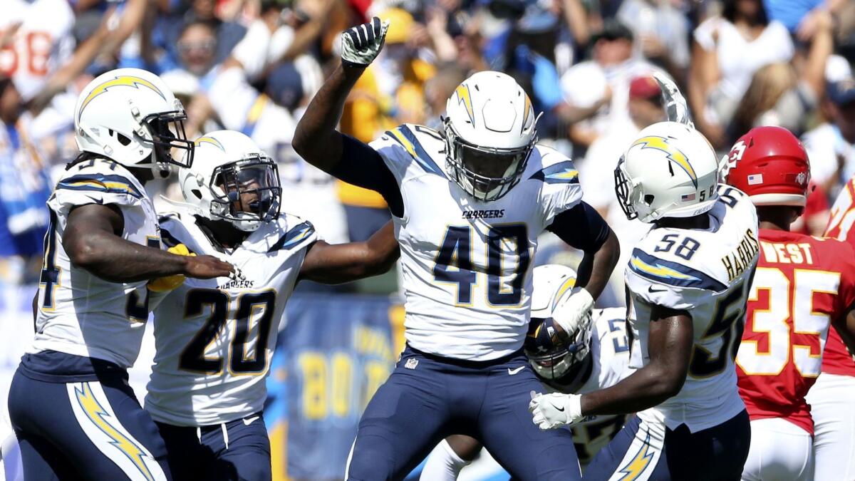 Chargers defensive end Chris McCain (40) celebrates after a sack against the Kansas City Chiefs on Sept. 24.