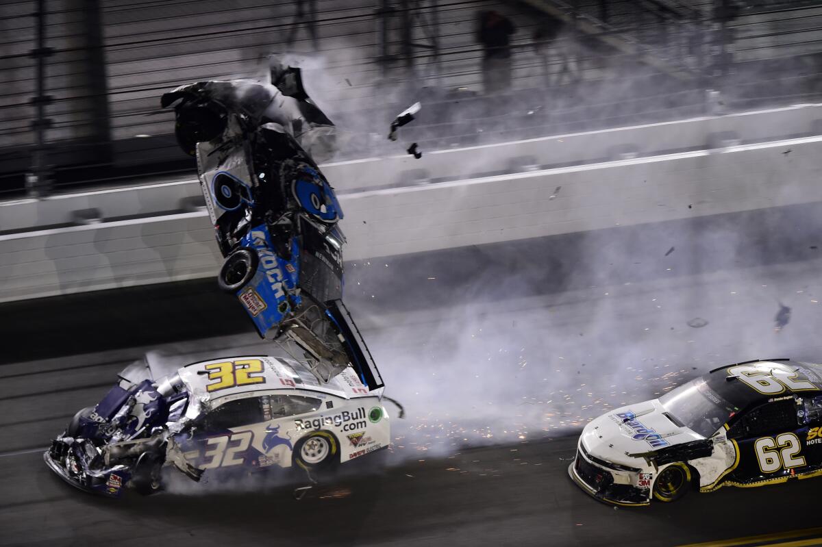 Ryan Newman's car flips in the air during a final-lap crash at the Daytona 500 on Monday.