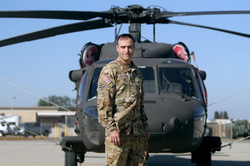 California Army National Guard Major Daniel Goldsmith, 38 of Agoura Hills, is a Blackhawk helicopter pilot at the Joint Forces Training Base in Los Alamitos on Wednesday, Oct. 30, 2019. Major Goldsmith recently assumed command of the 1st Assault Helicopter Battalion, 140th Aviation Regiment at the JFTB in Los Alamitos.