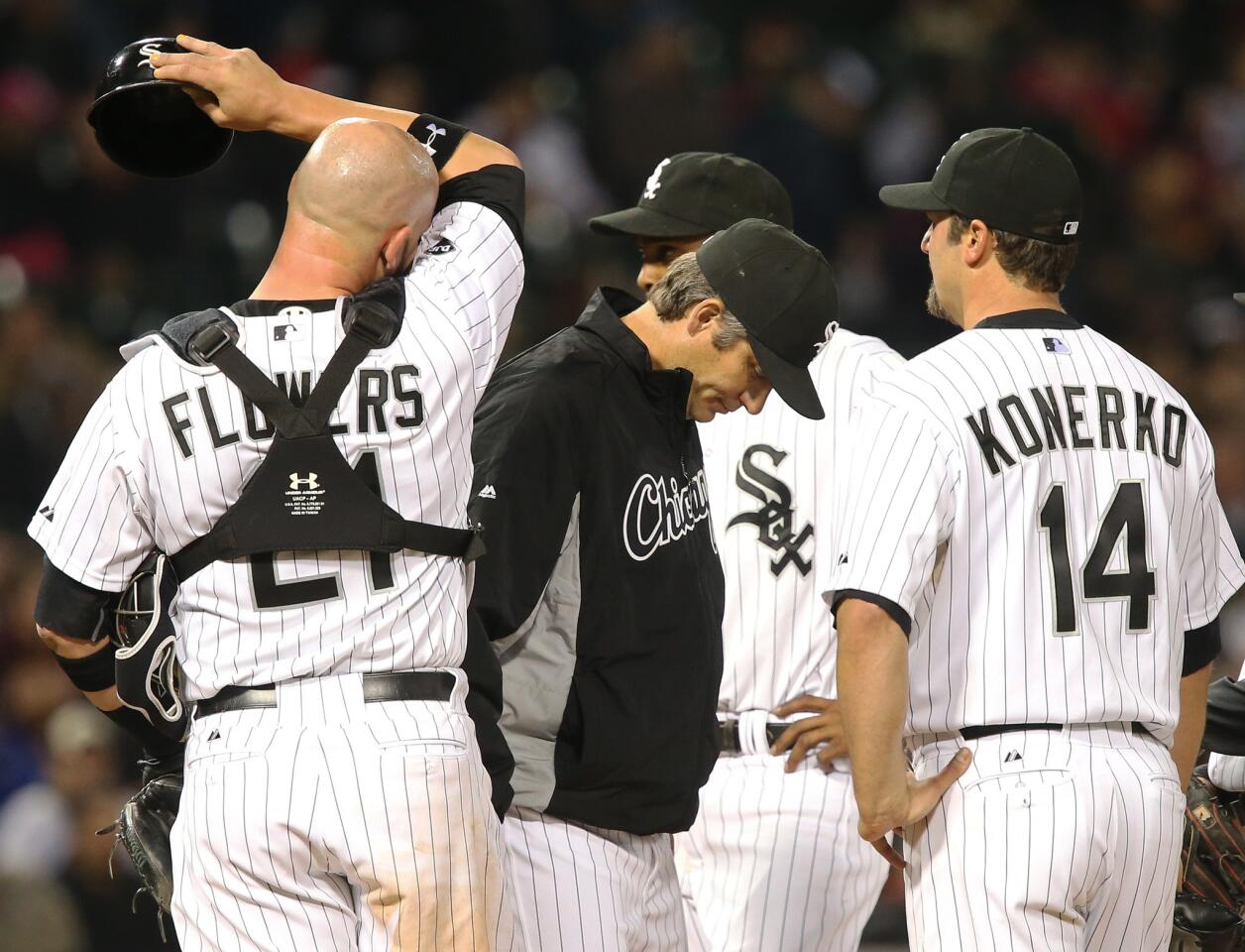 Robin Ventura looks down at the mound after taking out reliever Ronald Belisario after he gave up a one-run double in the ninth inning.