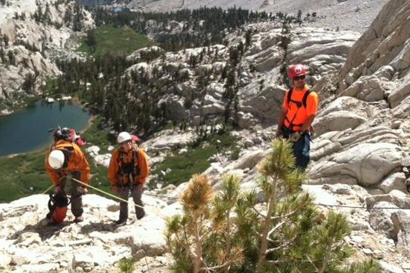 Ground crews search near Mirror Lake for 60-year-old John Likely. His remains were found Friday on Mt. Whitney.