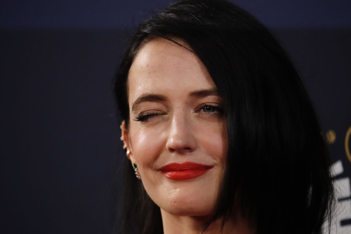 FILE - Actress Eva Green poses as she arrives at the Cesar award ceremony, on Feb. 28, 2020 in Paris. A lawyer for Eva Green on Thursday, Jan. 26, 2023 accused producers of a collapsed film of trying to damage the performer’s reputation by depicting her as a “diva.” The French actress, who played Vesper Lynd in James Bond thriller “Casino Royale,” is suing producers for a $1 million fee she says she is owed for “A Patriot." (AP Photo/Christophe Ena, File)