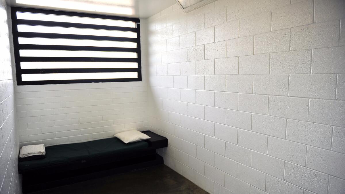 An empty solitary confinement cell at the Barry J. Nidorf Jevenile Hall in Sylmar.