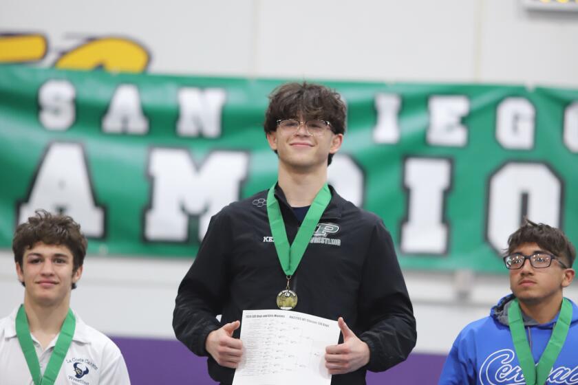 Poway's Bill Townson at 126 is among the members of the wrestling team heading to the state championships.