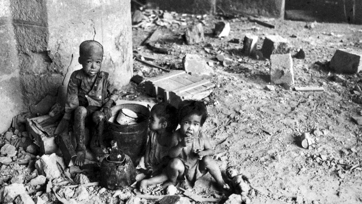 Children in Manila in 1945, in the aftermath of a protracted battle and other horrors.