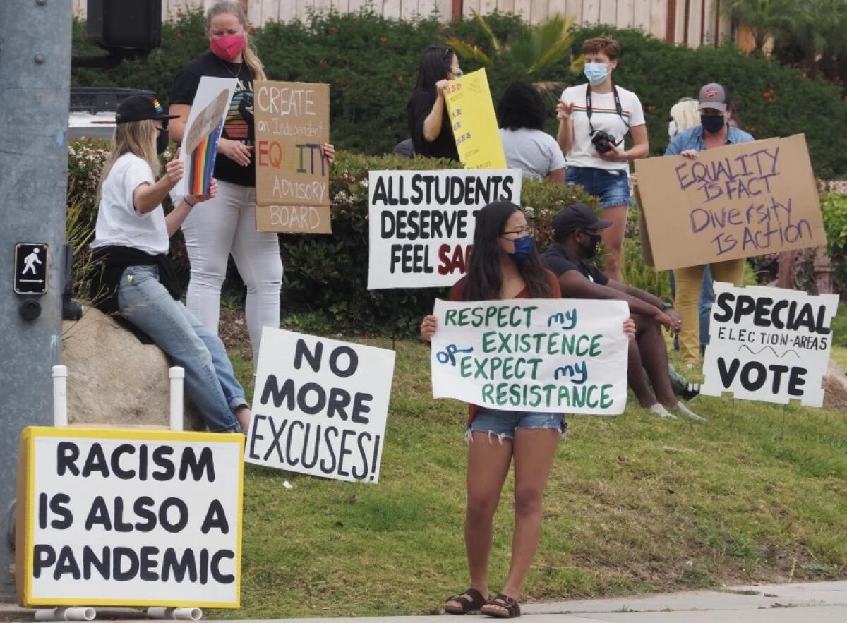 San Dieguito Union High School District students protest at the district office on April 11.