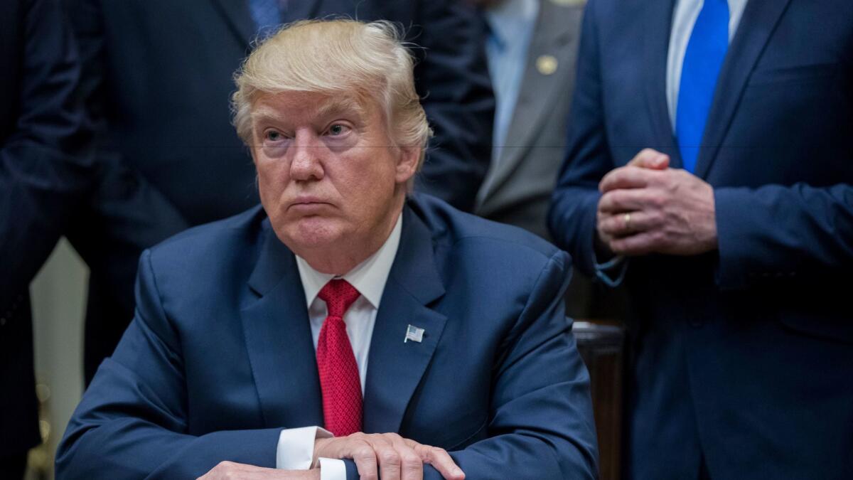 Trump participates in a signing ceremony for the Veterans Choice Program Extension and Improvement Act in the Roosevelt Room of the White House in Washington, DC, April 19, 2017.