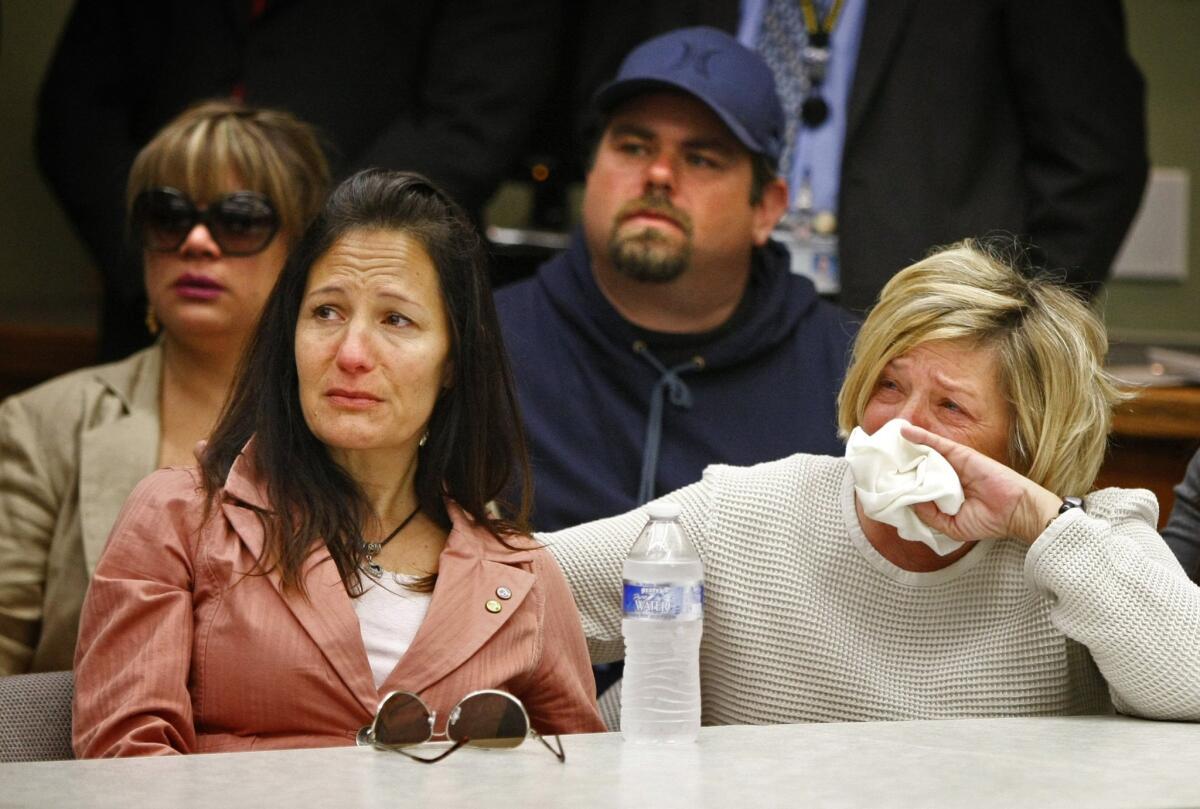 Erin McStay, left, and Susan Blake at a news conference in November 2013 at the San Bernardino County Sheriff's Department headquarters, where authorities announced the remains of Blake's son, Joseph McStay, and his family had been identified. Erin McStay is Joseph McStay's sister-in-law.