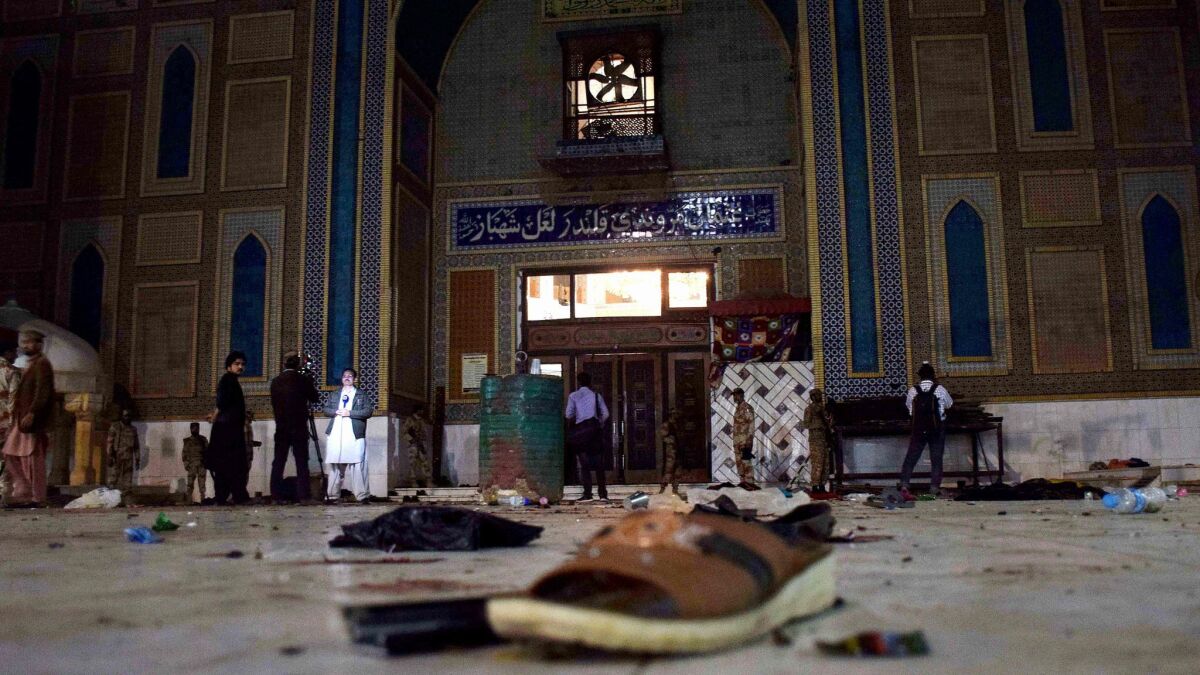 Pakistani soldiers cordon off the shrine of 13th century Muslim Sufi Saint Lal Shahbaz Qalandar after a bomb blew up in the town of Sehwan in Sindh province on Feb. 16, 2017.
