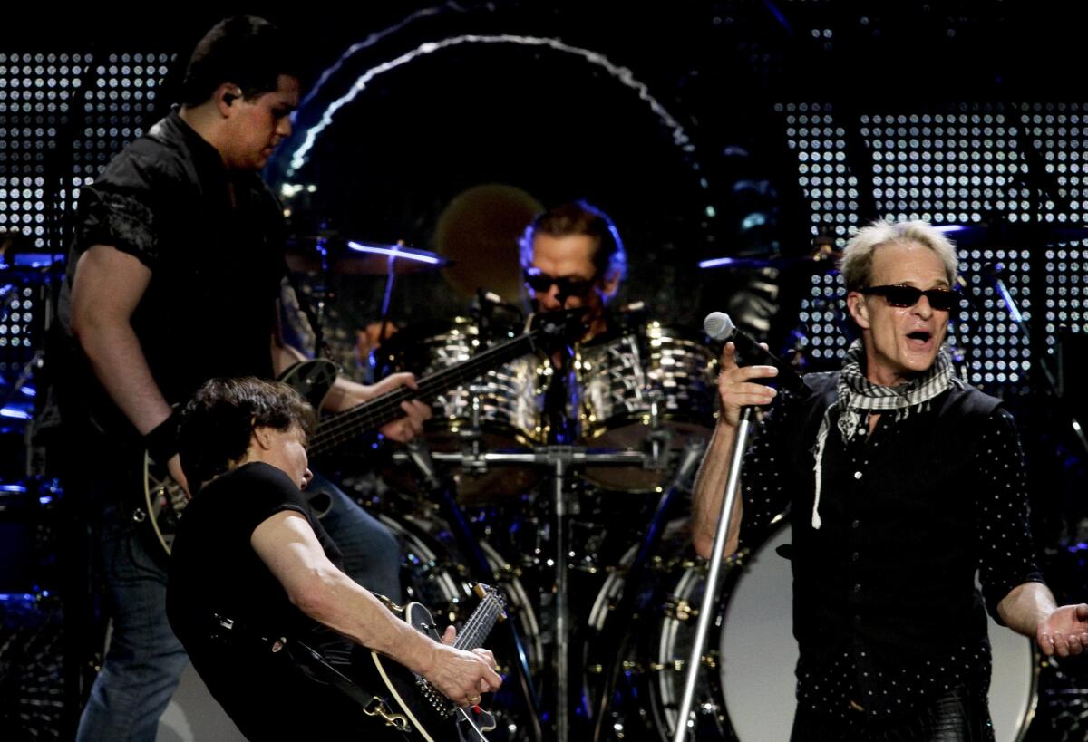 Van Halen, seen performing in 2012 at Staples Center, will play an outdoor concert Monday on Hollywood Boulevard.