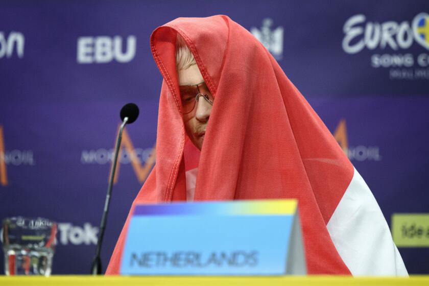 Joost Klein representing the Netherlands gestures, during a press conference after the second semi-final of the Eurovision Song Contest, at the Malmo Arena, in Malmo, Sweden, Thursday, May 9, 2024. Hours before the final, Dutch contestant Joost Klein was dramatically booted out by organizers over a backstage incident. He had failed to perform at two dress rehearsals on Friday, and contest organizer the European Broadcasting Union said it was investigating an “incident.” (Jessica Gow /TT News Agency via AP)