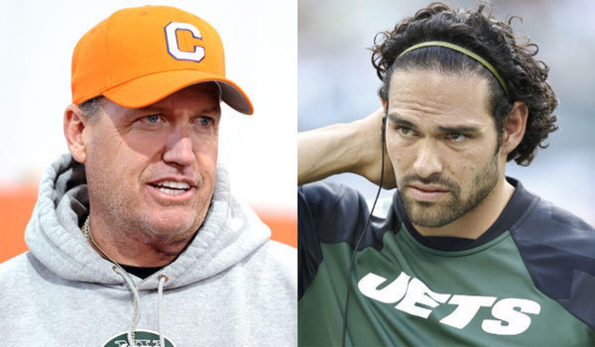 New York Coach Rex Ryan, left, still has former Jets quarterback Mark Sanchez's jersey number tattooed on his arm ... for now.