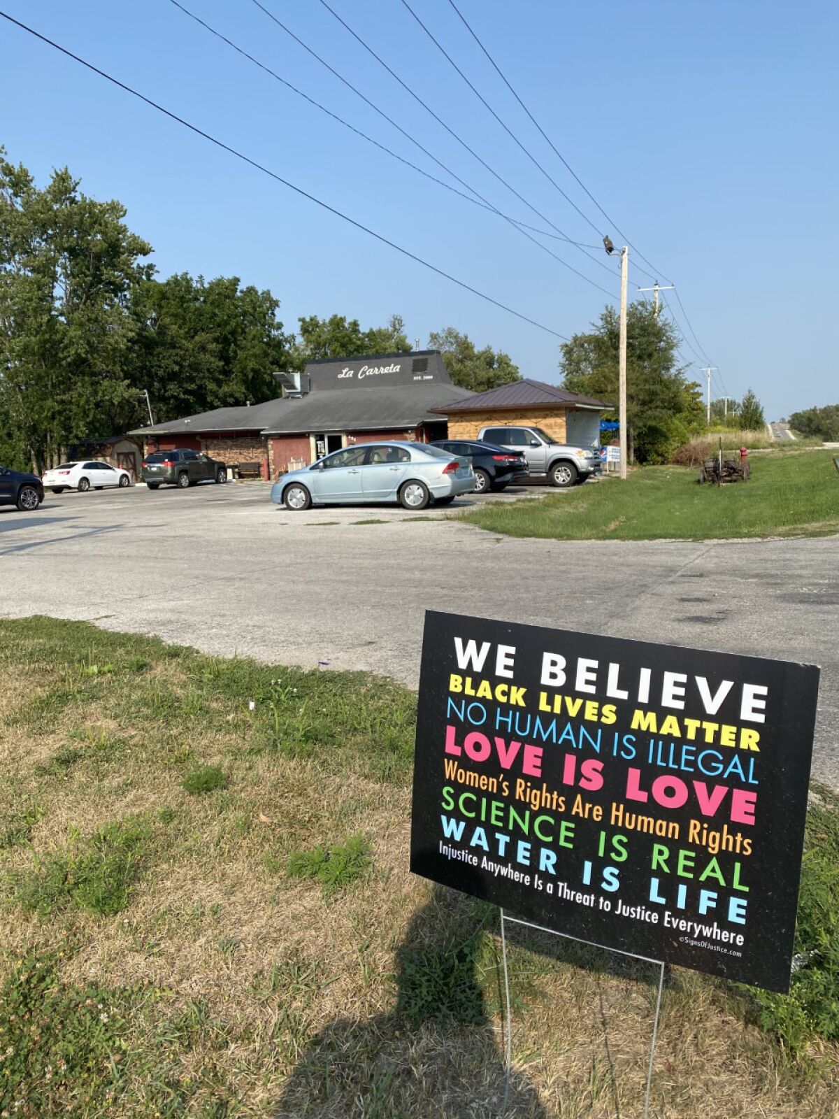 The original "We Believe" sign outside La Carreta Mexican Grill in Marshalltown, Iowa.