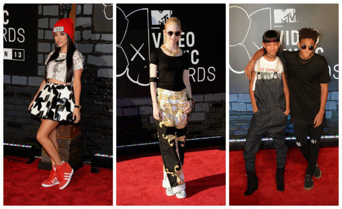 Becky G, left, Grimes (Detail: Versace pants), and Willow Smith and Jaden Smith attend the 2013 MTV Video Music Awards at the Barclays Center on Sunday in the Brooklyn.
