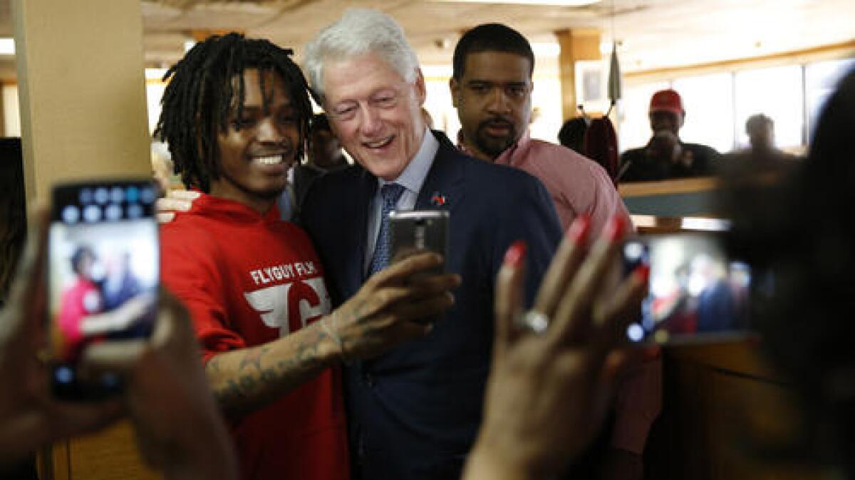 Former President Bill Clinton campaigns in Chicago for his wife.