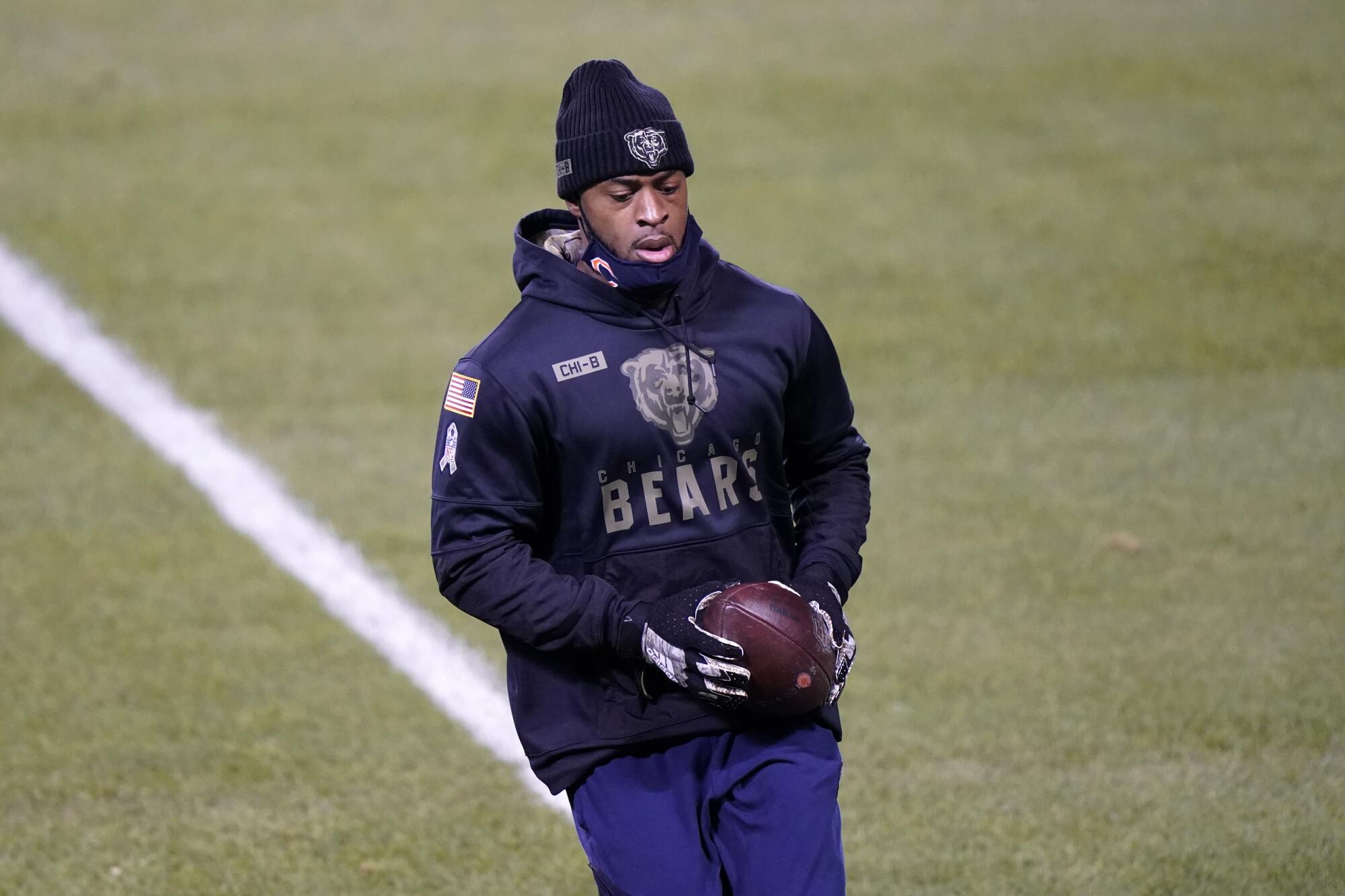 Allen Robinson warms up before the start of a game.