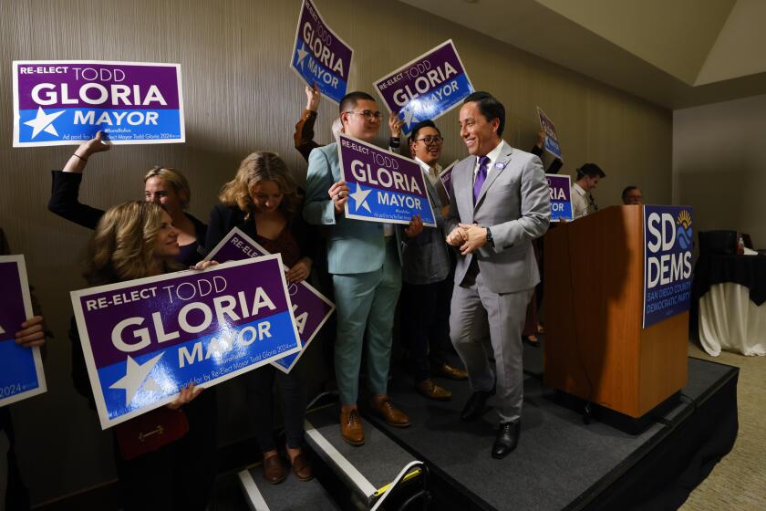 San Diego Mayor Todd Gloria walks off stage after speaking on election night at the Westin Gaslamp Quarter hotel.