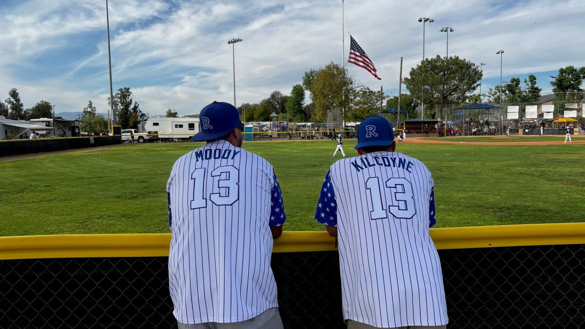 Sean Kilcoyne and Chad Moody watching a game at last year's Ramona Pony Baseball Invitational.