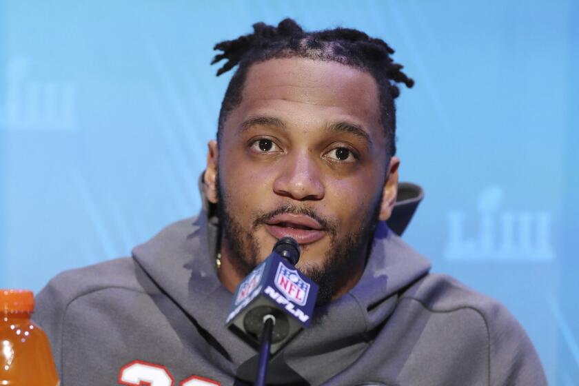 New England Patriots safety Patrick Chung answers questions during opening night for the NFL Super Bowl 53 football game at State Farm Arena, Monday, Jan. 28, 2019, in Atlanta. (AP Photo/Steve Luciano)