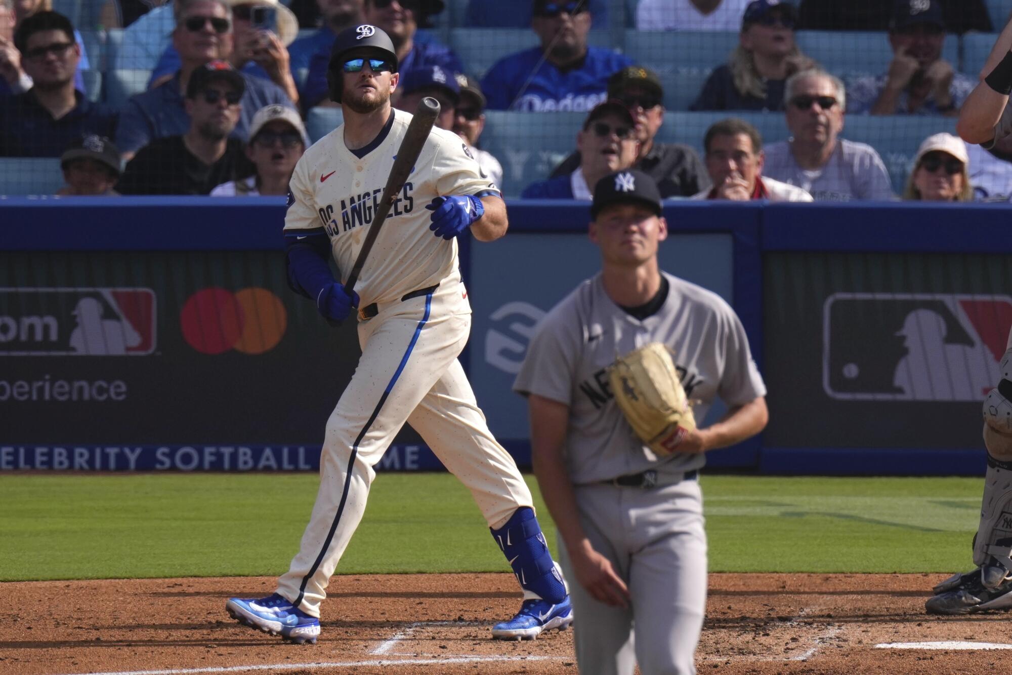 Max Muncy hits a two-run home run off New York Yankees pitcher Will Warren at Dodger Stadium.