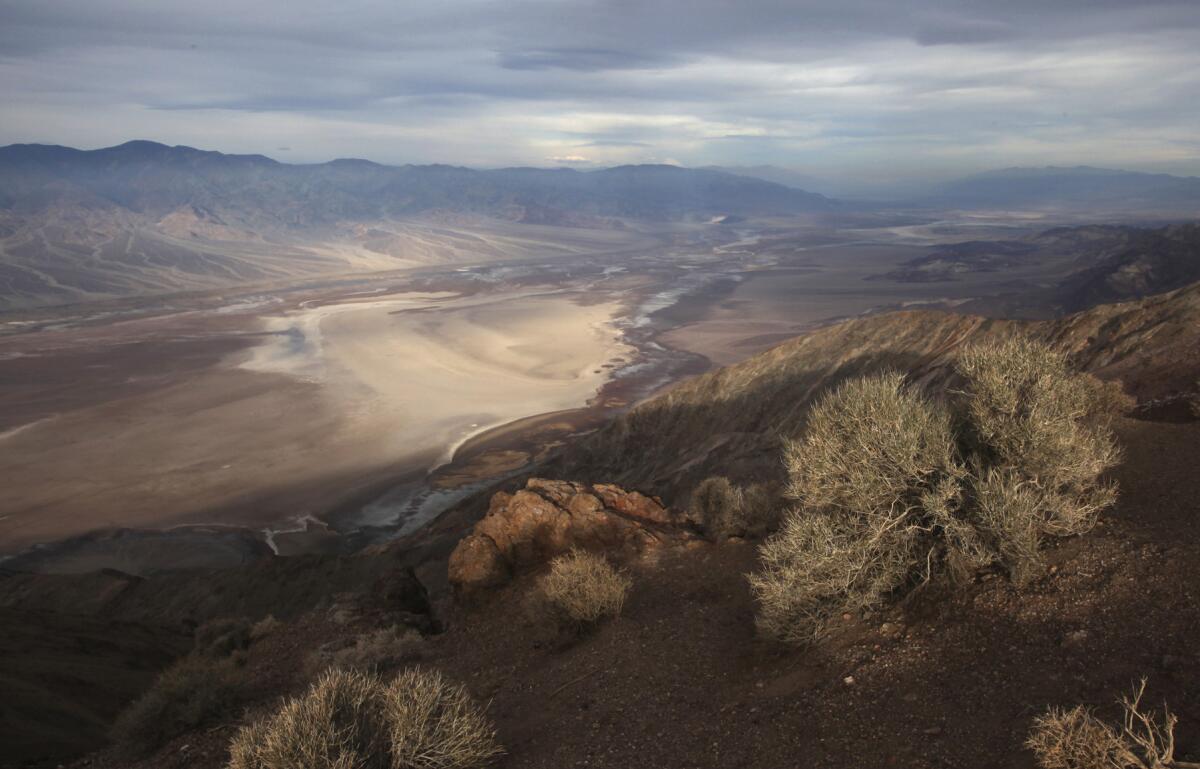 Dante's View offers a wide vista of Death Valley National Park with the Badwater Basin below, rimmed by the Panamint Mountain Range.