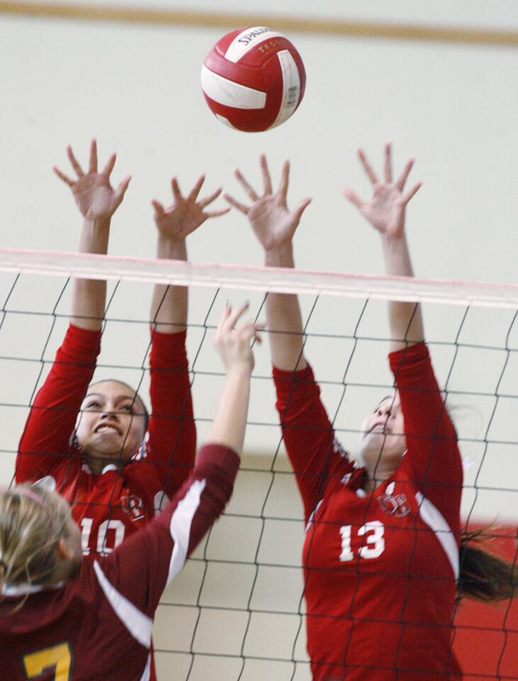 Photo Gallery: Burroughs v. Arcadia Pacific League girls volleyball