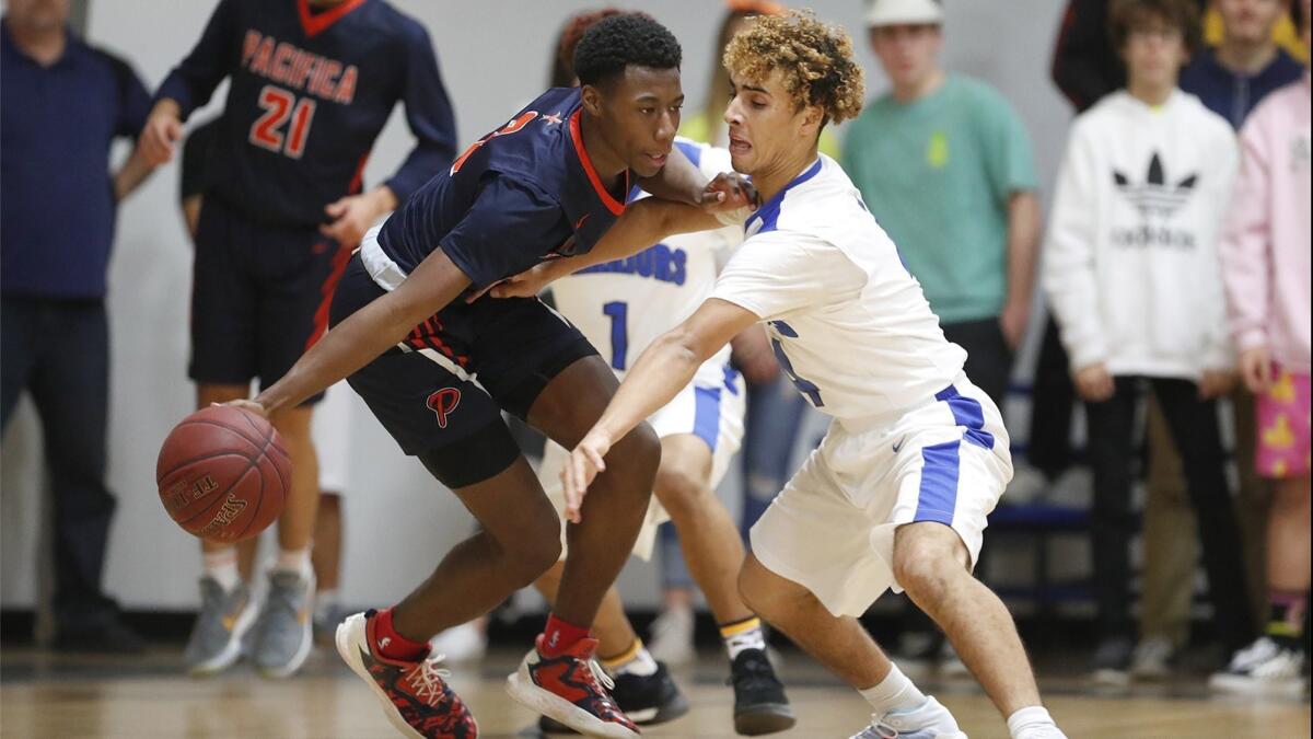 Dominick Harris, shown dribbling the ball on Jan. 31, is transferring from Pacifica Christian Orange County High to Temecula Rancho Christian at the end of the school year.