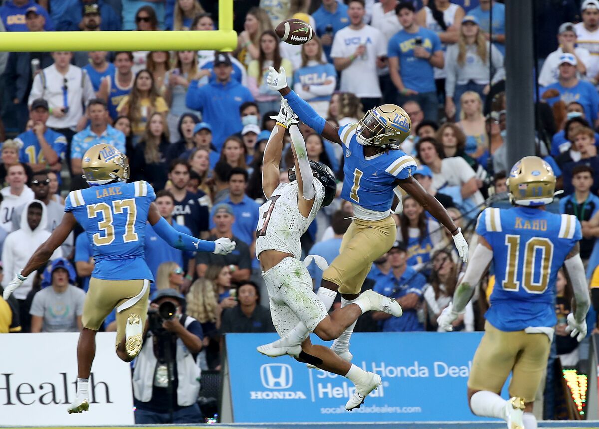 UCLA defensive back Jay Shaw breaks up a pass intended for Oregon wide receiver Johnny Johnson III in the third quarter.