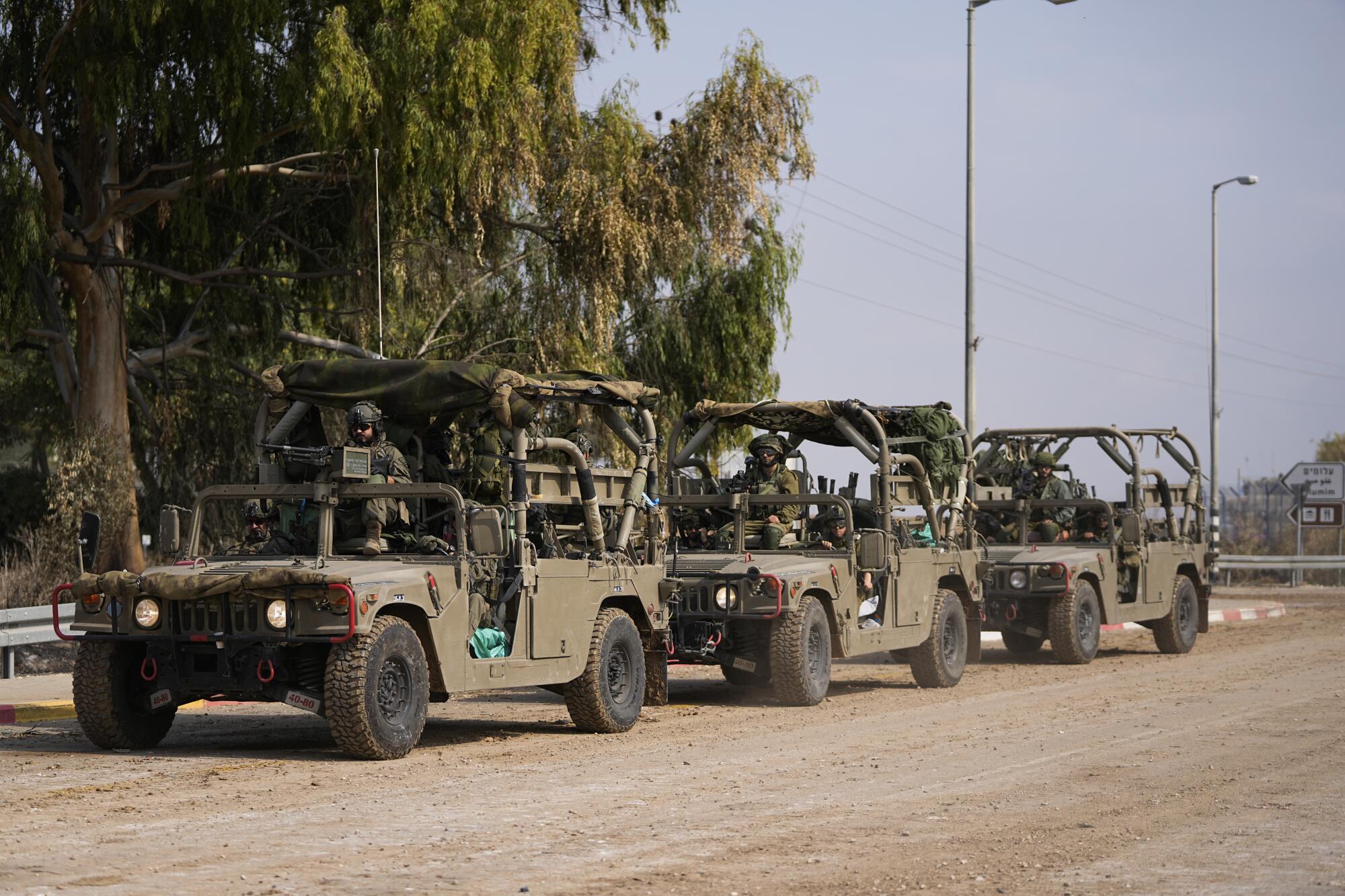 A line of Israeli military vehicles.