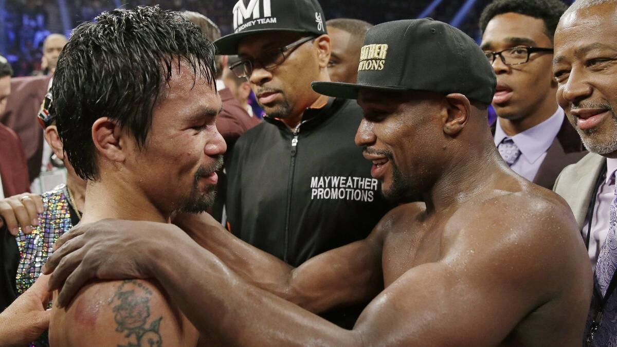 Manny Pacquiao, left, and Floyd Mayweather Jr. generated $600 million in revenue with their 2015 bout. A rematch could be looming.