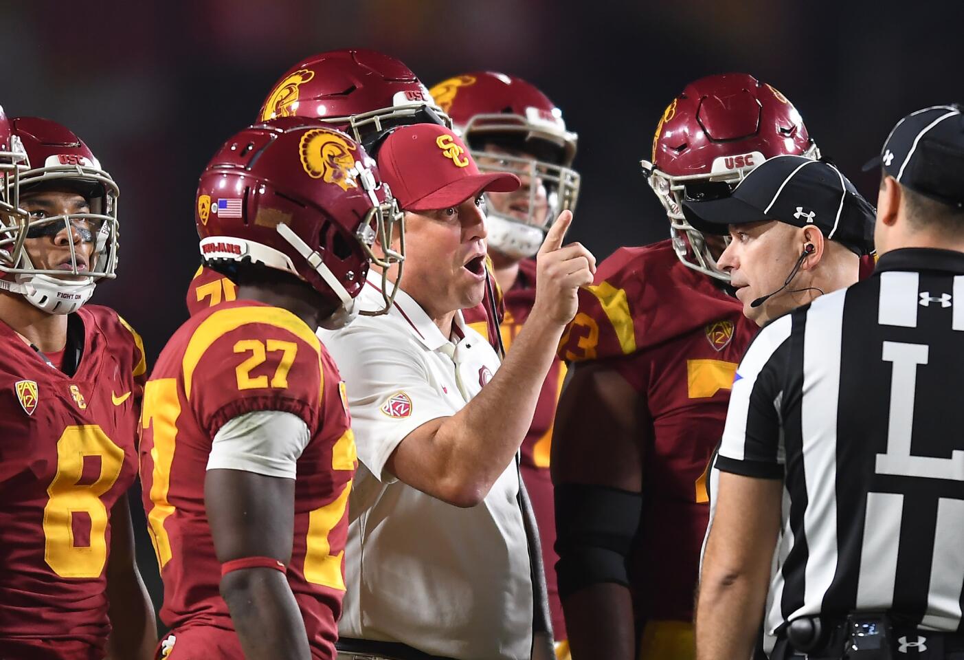 USC head coach Clay Helton complains to officials in the second quarter at the Coliseum Saturday.