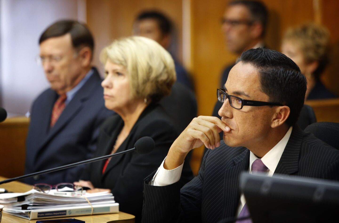 San Diego City Council President Todd Gloria, right, listens to public comment about Mayor Bob Filner during a special meeting in the council chambers. Later in the afternoon, Filner appeared and announced his resignation, with Gloria appointed interim mayor.