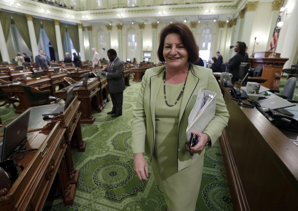 Assembly Speaker-elect Toni Atkins, D-San Diego, leaves the Assembly after she was elected to the position at the Capitol in Sacramento, March 17, 2014. (AP Photo/Rich Pedroncelli)