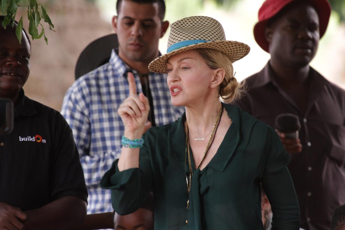 Madonna addresses members of the community in Kasungu, Malawi, in November.