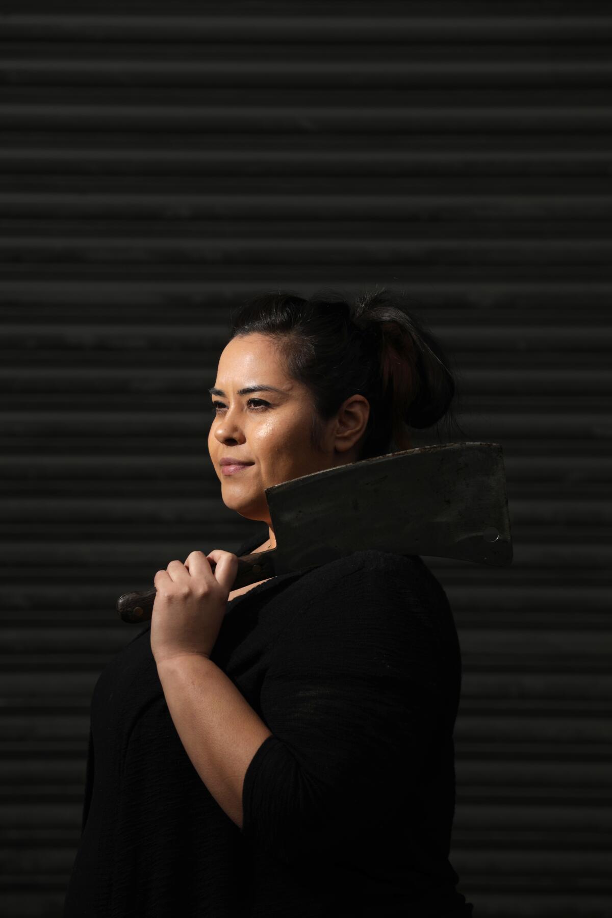 Elvia Huerta poses for a portrait at Smorgasburg in Row DTLA.