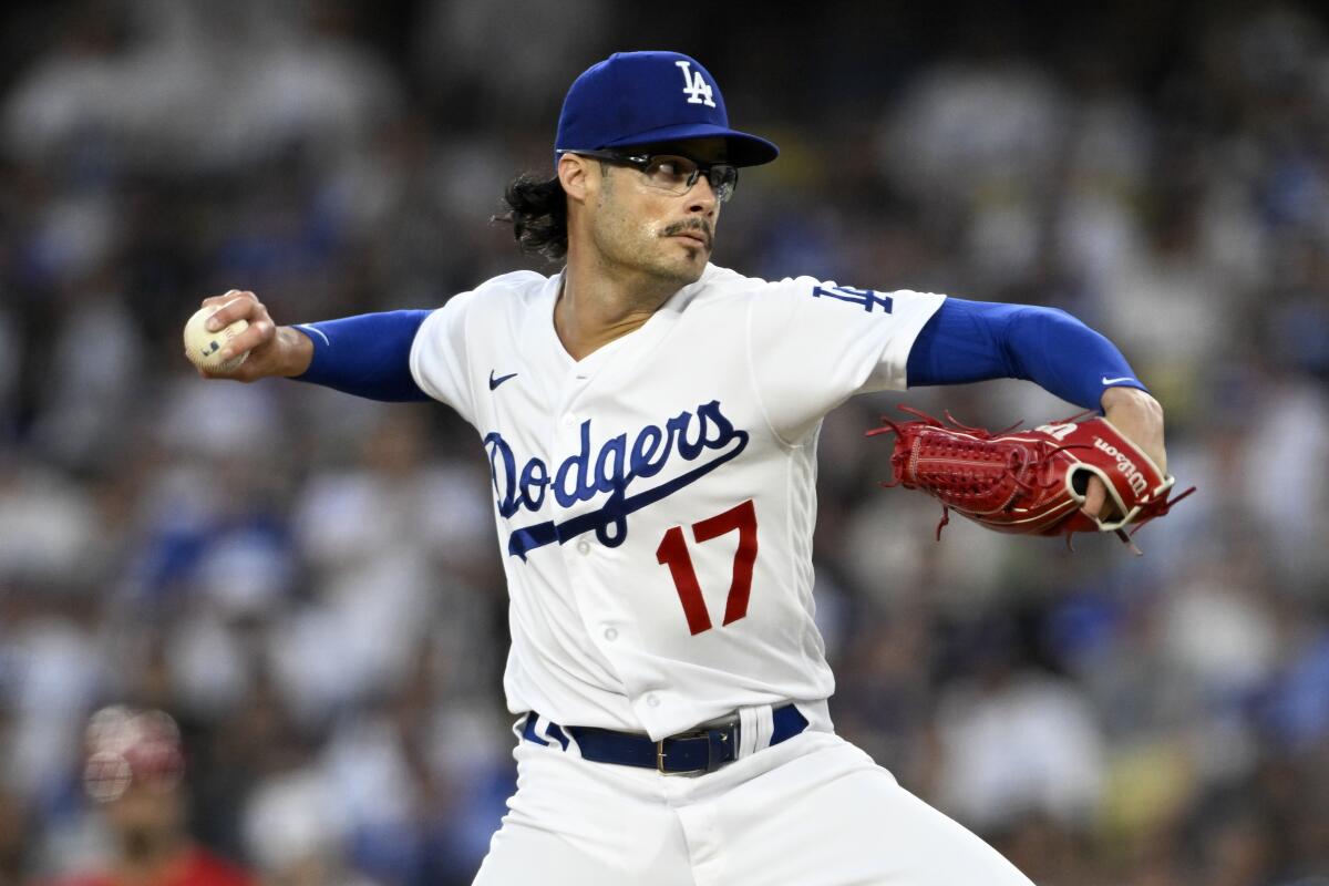 Dodgers' Joe Kelly pitches against the Cincinnati Reds on July 29, 2023, in Los Angeles.