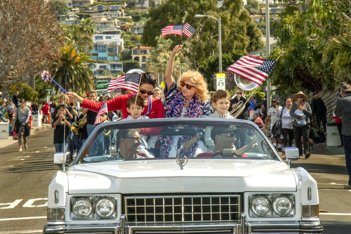 Citizen of the Year Sande St. John rides in the 54th Annual Patriot's Day Parade in Laguna Beach in 2020.