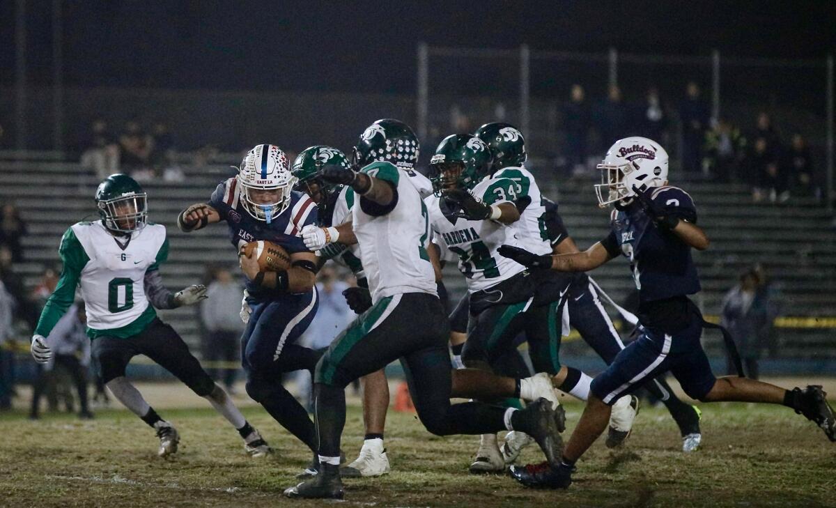 Garfield running back Damian Cornejo carries the ball against Gardena.