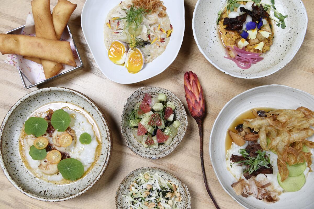 A spread of porridge, puffs and vegetable sides at Porridge + Puffs.