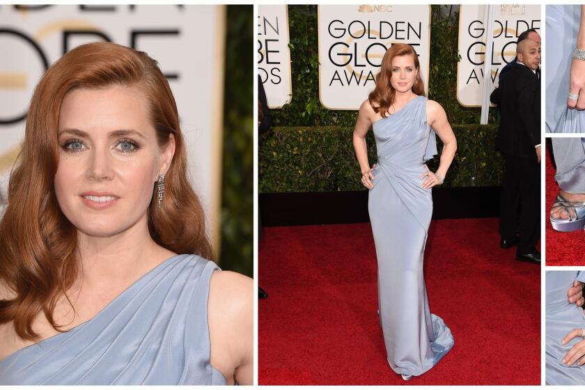 Adams wore a blue Versace gown to the 2015 Golden Globes.