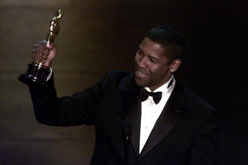 Ken Hively –– – Denzel Washington won the Best Actor Award for "Training Day" at the 74th Annual Academy Awards at the Kodak Theatre in Hollywood on March 24, 2002. Washington is the first African American Male since to win the award Sidney Poitier in 1961.
