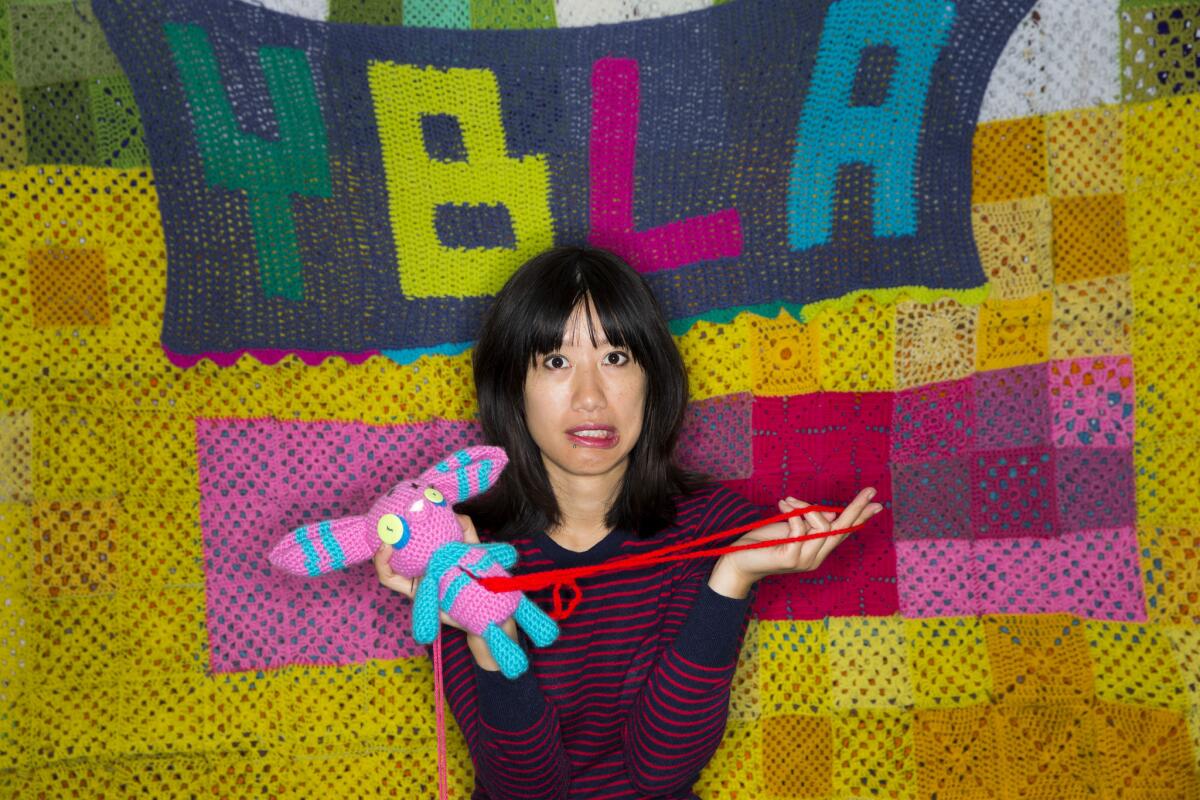 Carol Zou takes over Yarn Bombing Los Angeles (YBLA), a self-described group of "guerrilla knitters."