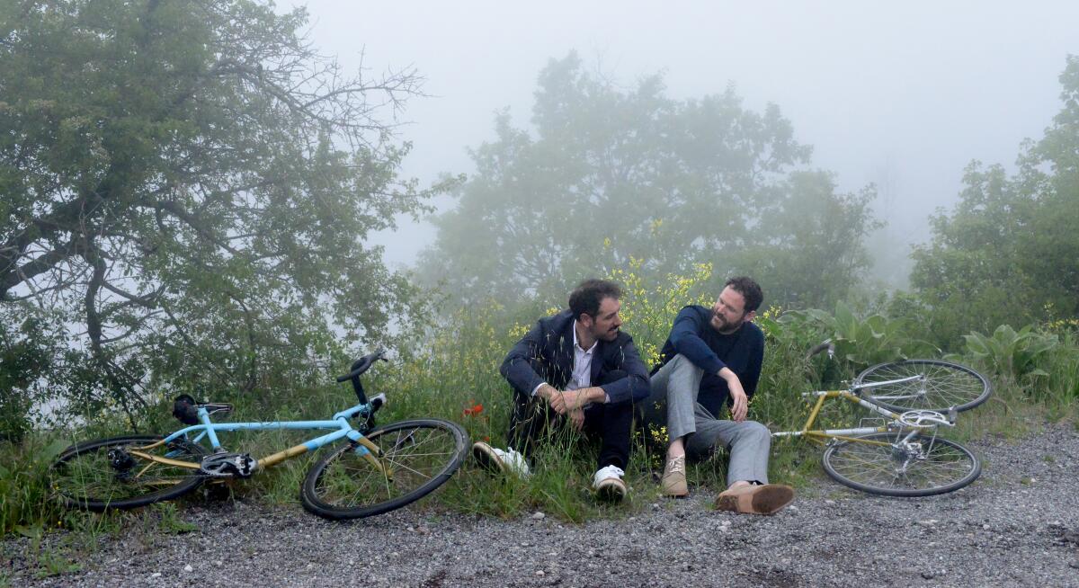 Michael Angelo Covino, left, and Kyle Marvin rest on the side of the Col de Vence during the 2019 Cannes Film Festival.