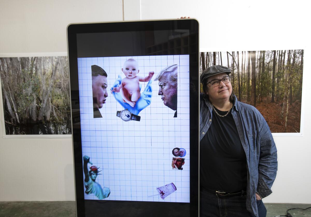 Catherine Opie stands next to one of the digital collages that will appear in her solo exhibition at Regen Projects.