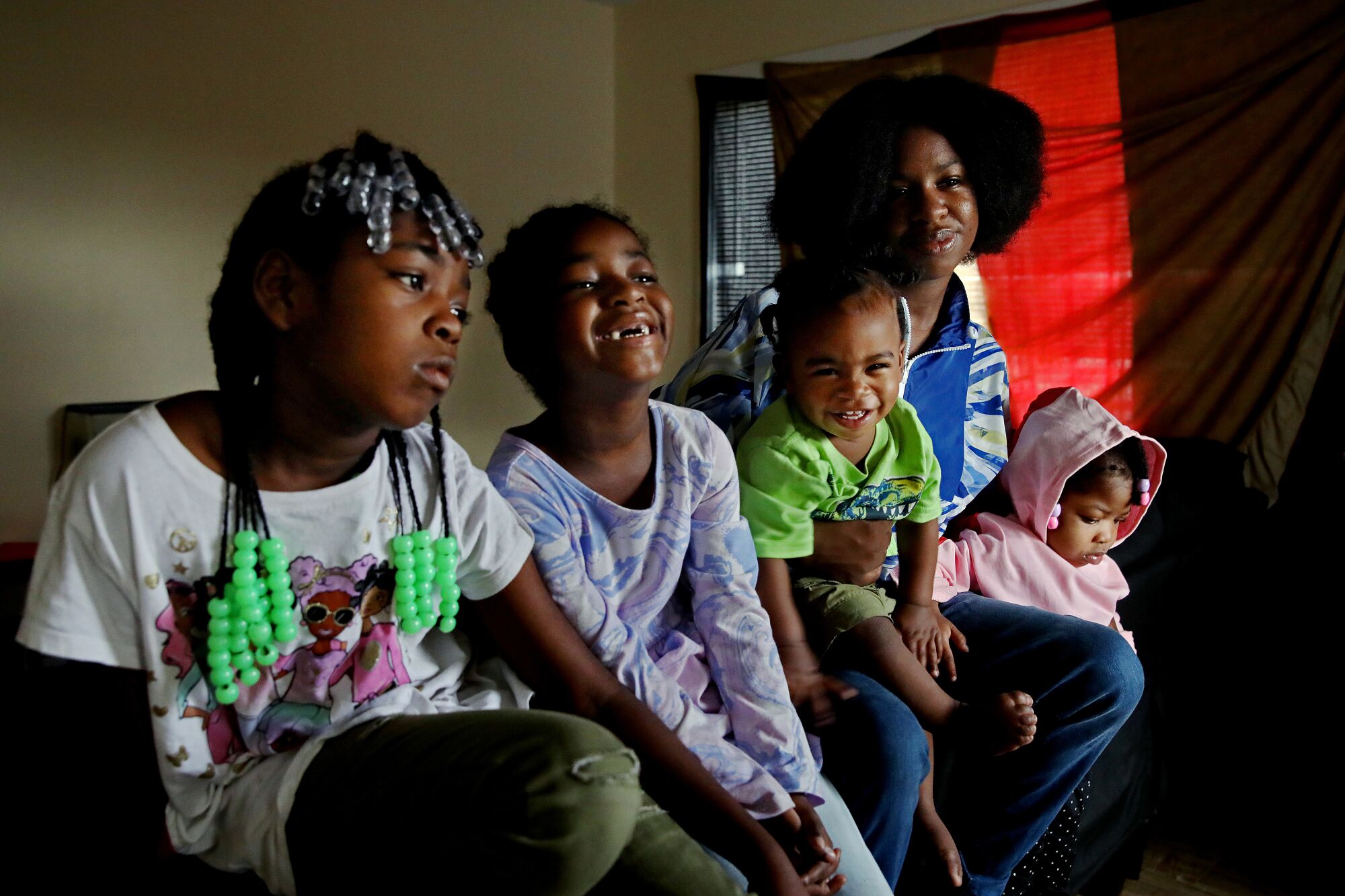 Courtney Bailey, mother of five children at their apartment in Los Angeles.
