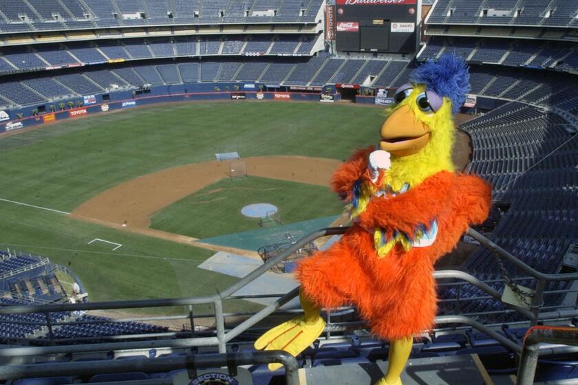 FILE - In this Sept. 25, 2003, file photo, Ted Giannoulas, the San Diego Chicken, poses in the upper deck above Qualcomm Stadium in San Diego. The Chicken ranks first in Forbes magazine's survey of 10 most-liked sports mascots. (AP PHoto/Lenny Ignelzi,File)