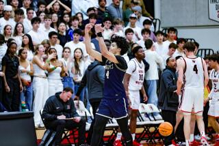 Tyran Stokes of Sherman Oaks Notre Dames tries to fire up the crowd after the Knights come back from 15-point deficit.