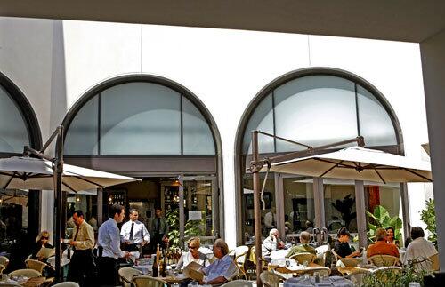 The outdoors dining room of Caffe Roma in Beverly Hills.