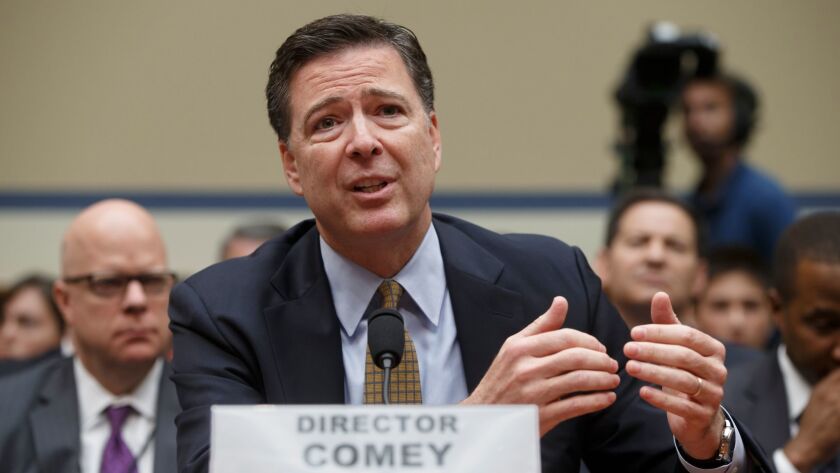 FBI Director James Comey testifies before the House Oversight Committee to explain his agency's recommendation to not prosecute Hillary Clinton, on July 7.