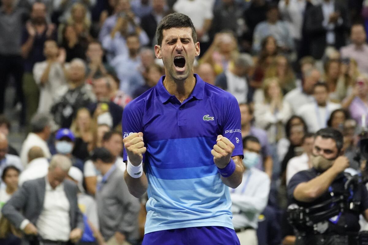 Novak Djokovic, of Serbia, reacts after defeating Alexander Zverev, of Germany, during the semifinals of the US Open tennis championships, Friday, Sept. 10, 2021, in New York. (AP Photo/Elise Amendola)